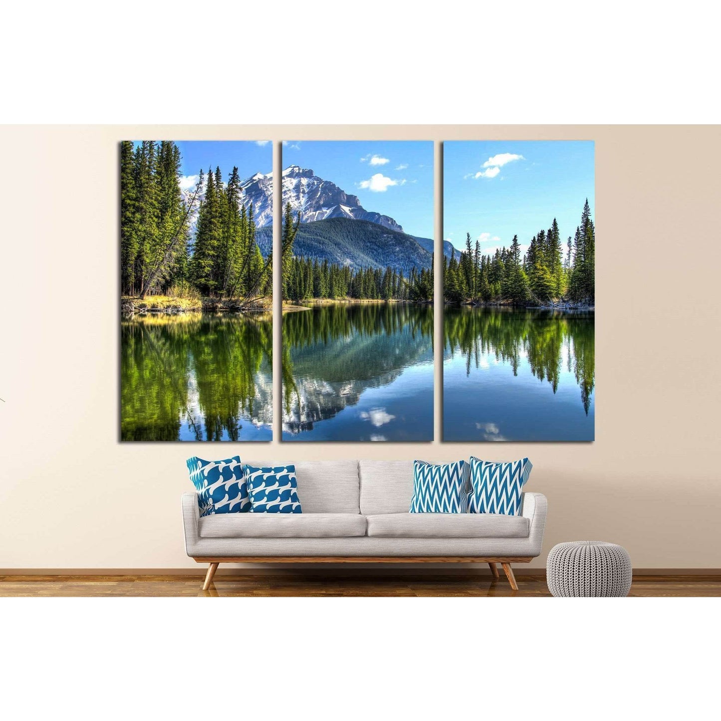 Reflective Pine Forest and Mountain Range Canvas for Rustic DecorThis canvas print portrays the tranquil beauty of a mountain lake, reflecting the crisp image of the surrounding pines and the imposing mountain range. The clear blue sky and the still water
