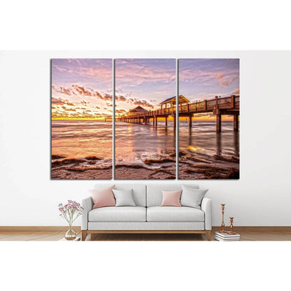 Sunset at Clearwater Beach Florida №1298 Ready to Hang Canvas PrintThis four-panel canvas print captures the serene beauty of a pier at sunset with golden skies reflecting on gentle waters. The warm colors offer a soothing effect, making it an ideal wall