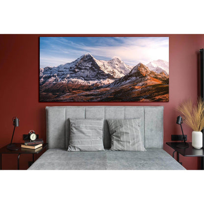 Rustic Mountain Canvas Art: A Panoramic Wall Decor StatementThis canvas print captures the rugged beauty of snow-capped mountains under a serene sky, ideal for adding a natural touch to corporate offices or living room wall decor. The warm tones and textu