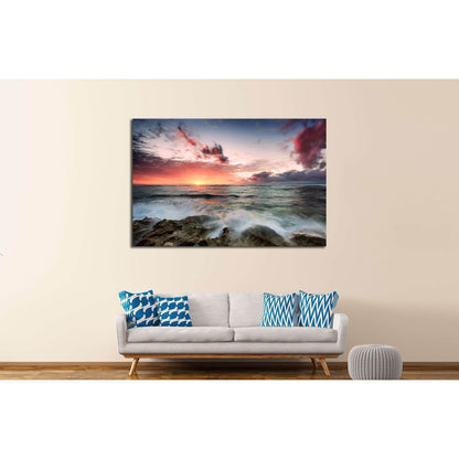 A cloudy sunset as waves crash over rocks №2823 Ready to Hang Canvas PrintCanvas art arrives ready to hang, with hanging accessories included and no additional framing required. Every canvas print is hand-crafted, made on-demand at our workshop and expert