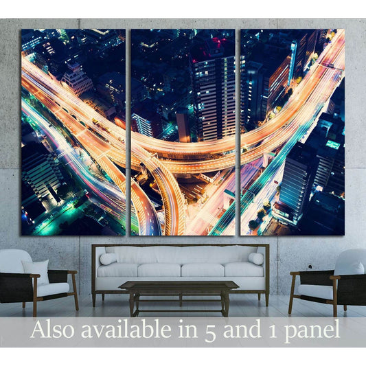 Aerial Shinjuku highway interchange triptych canvas print above sofa in modern living room