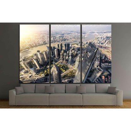 Aerial Shanghai Lujiazui skyline triptych canvas print above sofa in a modern living room