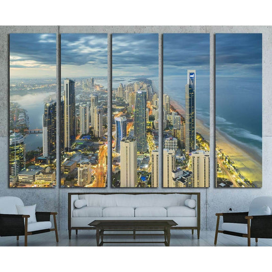 Gold Coast skyline canvas print in five panels above a sofa with beachfront towers at dusk