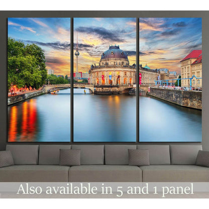 Berlin TV Tower and Bode Museum sunset triptych canvas print above sofa in modern living room