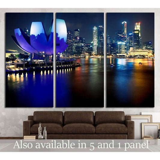 Singapore skyline triptych canvas print with ArtScience Museum above sofa in modern living room