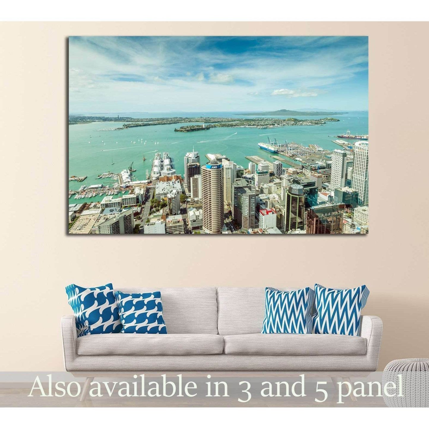 Auckland skyline and turquoise harbour canvas print hung above a sofa in a modern living room