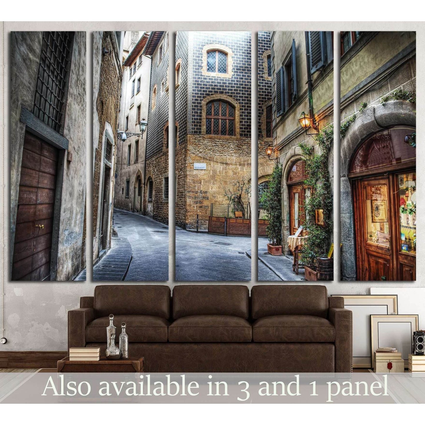 Florence alley canvas print showing a narrow Tuscan street above a sofa in a rustic living room