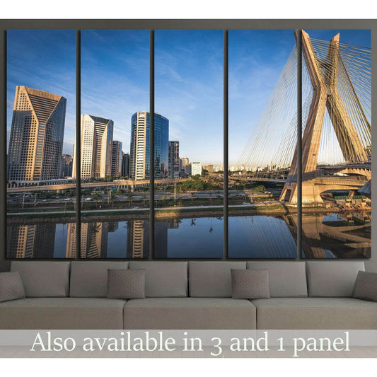 Sao Paulo Ponte Estaiada bridge canvas print with skyline above sofa in modern living room