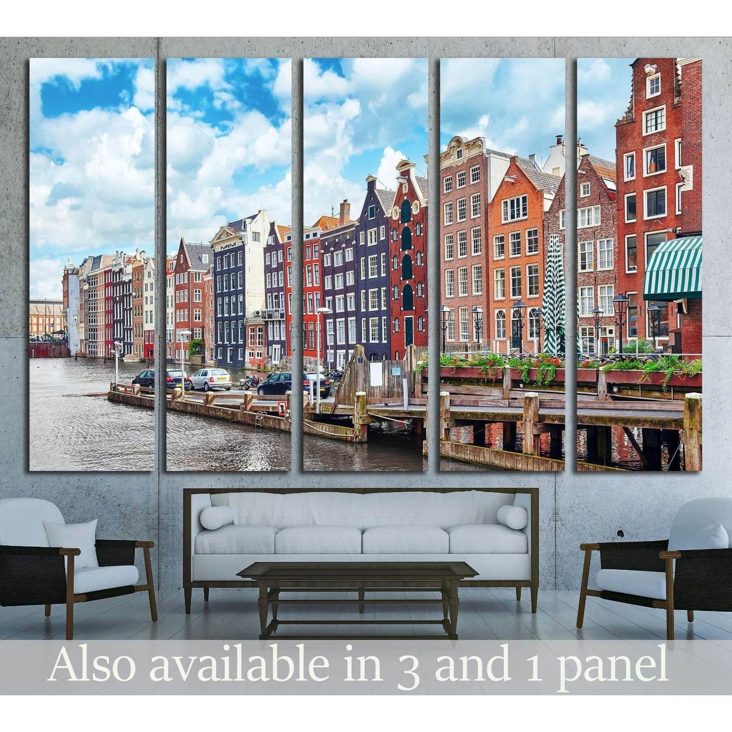 Amsterdam canal houses canvas print displayed as a five-panel artwork above a sofa in a modern living room