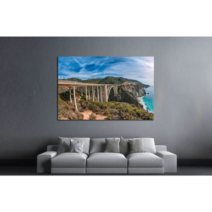 Big Sur's Bixby Bridge Wall Decor - Majestic Pacific Ocean View ArtworkThis canvas print features the iconic Bixby Creek Bridge on California's Big Sur coast, renowned for its stunning architectural beauty and the breathtaking scenery surrounding it. The