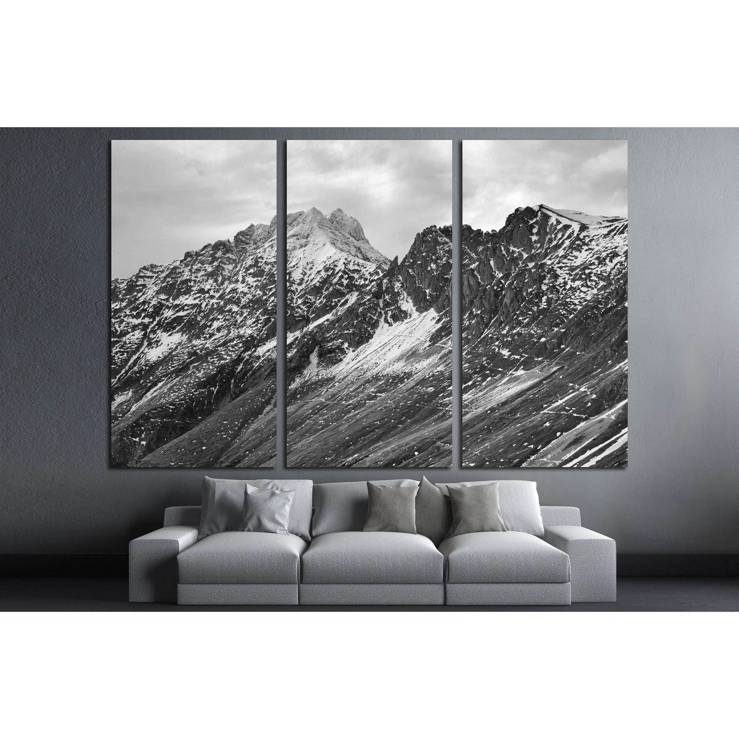 Black and White Rugged Mountains Wall Art for Modern InteriorsThis canvas print presents a striking black and white image of rugged mountain peaks, their sharp contrasts and textures highlighted to create a sense of depth and grandeur. It's a timeless pie