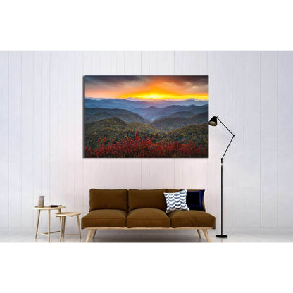 Autumn Sunset Over Mountains Canvas Print for Warm Home DecorThis canvas print portrays a vibrant autumnal sunset over a mountain range, with the warm colors of the foliage providing a stark contrast against the cool blues of the distant peaks, creating a