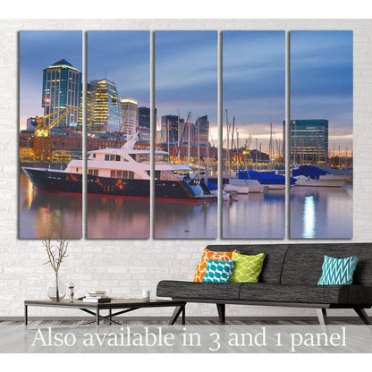 Buenos Aires marina canvas print with yachts and skyline at dusk above sofa in modern living room