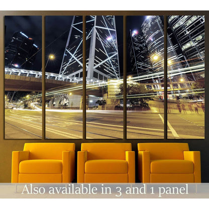 Hong Kong night skyline canvas print with bright car light trails and skyscrapers above modern seating