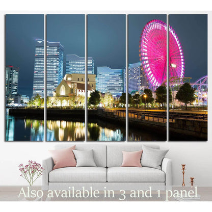 Japanese waterfront skyline canvas print with pink ferris wheel at night above a sofa in a modern living room
