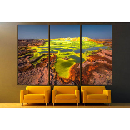 Sulphur Springs of Dalol Volcano Artwork for Nature Inspired DecorThis canvas print vividly captures the Dalol volcano in Ethiopia, known for its surreal, otherworldly landscapes. The rich, warm hues of the terrain contrast with the vivid acidic pools, ma