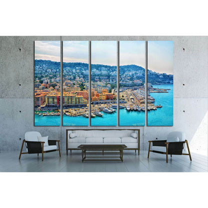 Cote d'Azur Harbor Canvas Print - French Riviera Seaside Wall ArtThis canvas print features a vibrant aerial view of the Cote d'Azur, showcasing the bustling harbor with an array of boats and the vividly colored buildings that are iconic to the French Riv