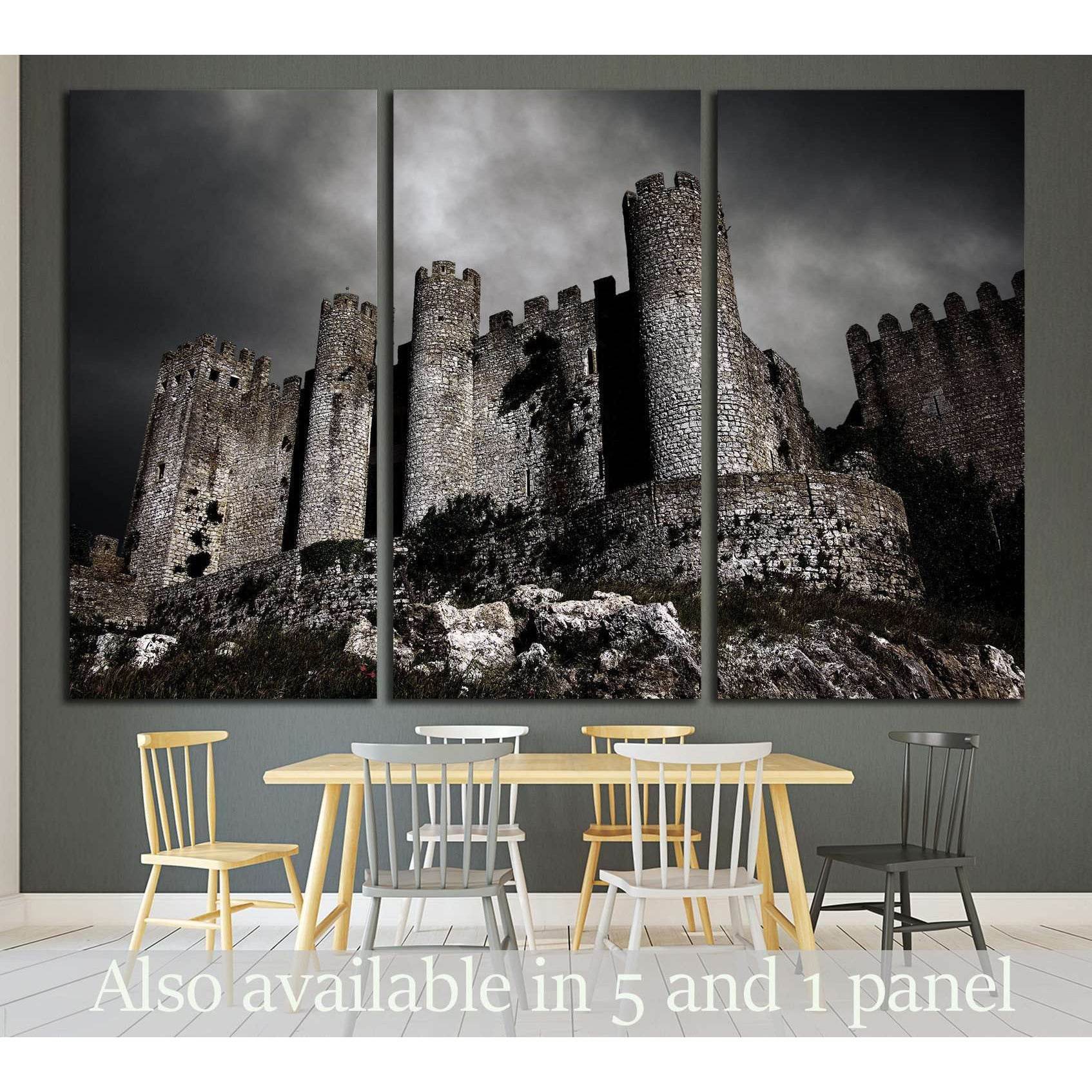 Medieval Castle Under Brooding Sky Canvas Print for Historic DecorThis canvas print portrays an imposing medieval castle set against a dramatic sky, evoking a sense of history and timeless strength. The moody atmosphere captured in this image makes it a c