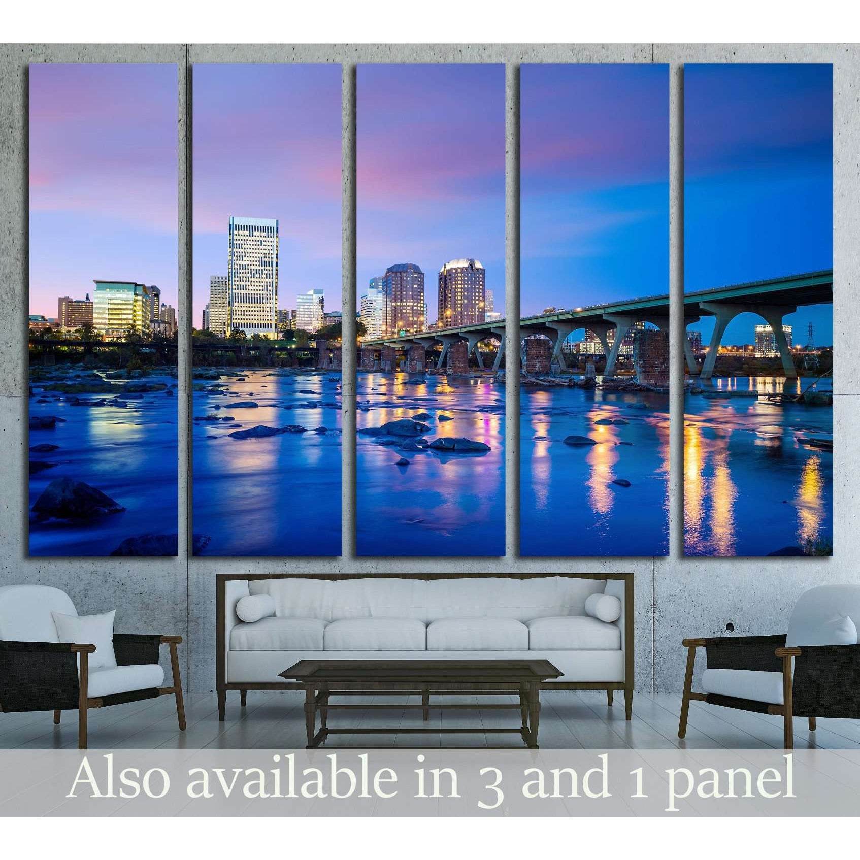 Richmond skyline canvas print with James River reflections at twilight, displayed above a sofa in a modern living room