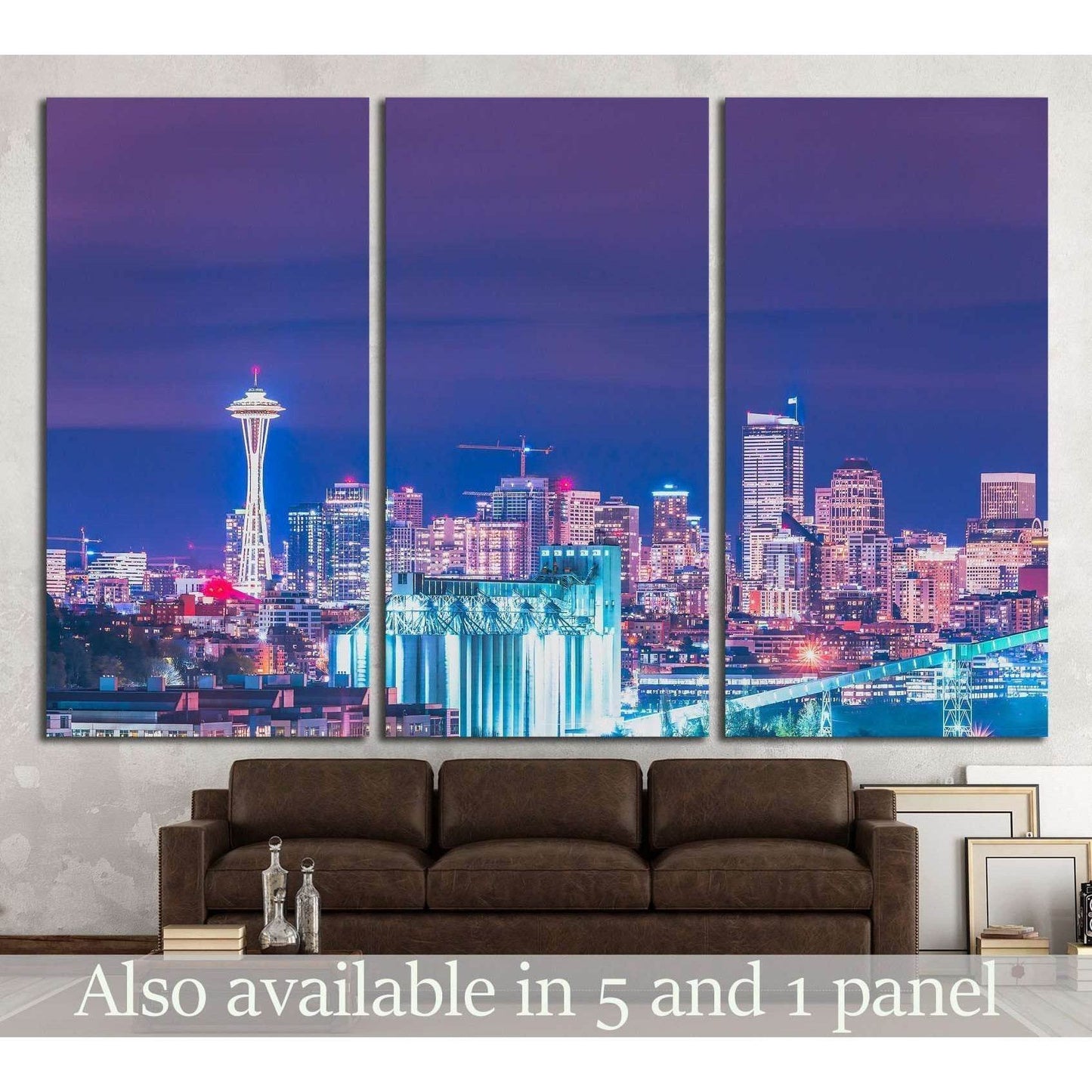 Seattle skyline canvas print with Space Needle at night above a sofa in a modern living room