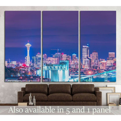 Seattle skyline canvas print with Space Needle at night above a sofa in a modern living room