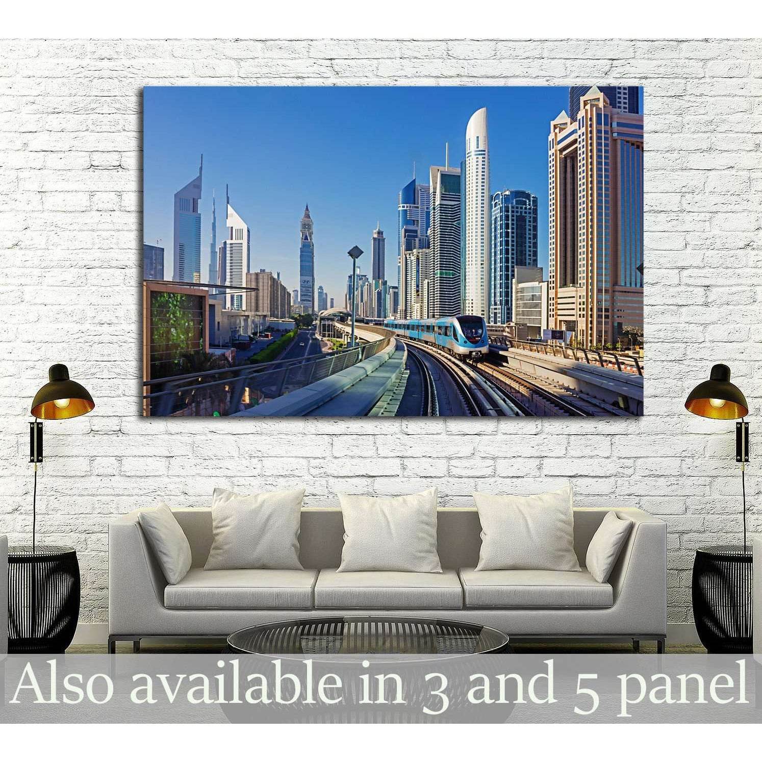 Dubai Metro canvas print with train and skyscrapers hung above sofa in a modern living room