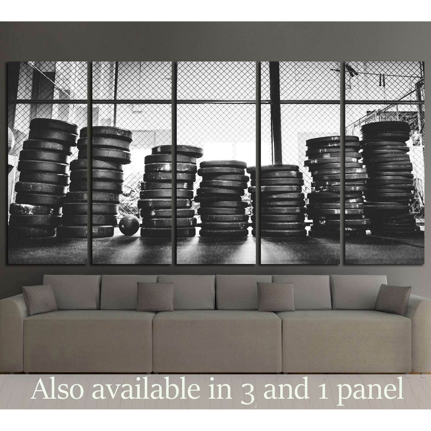 Black and white weight plates canvas print with stacked gym discs in front of industrial windows