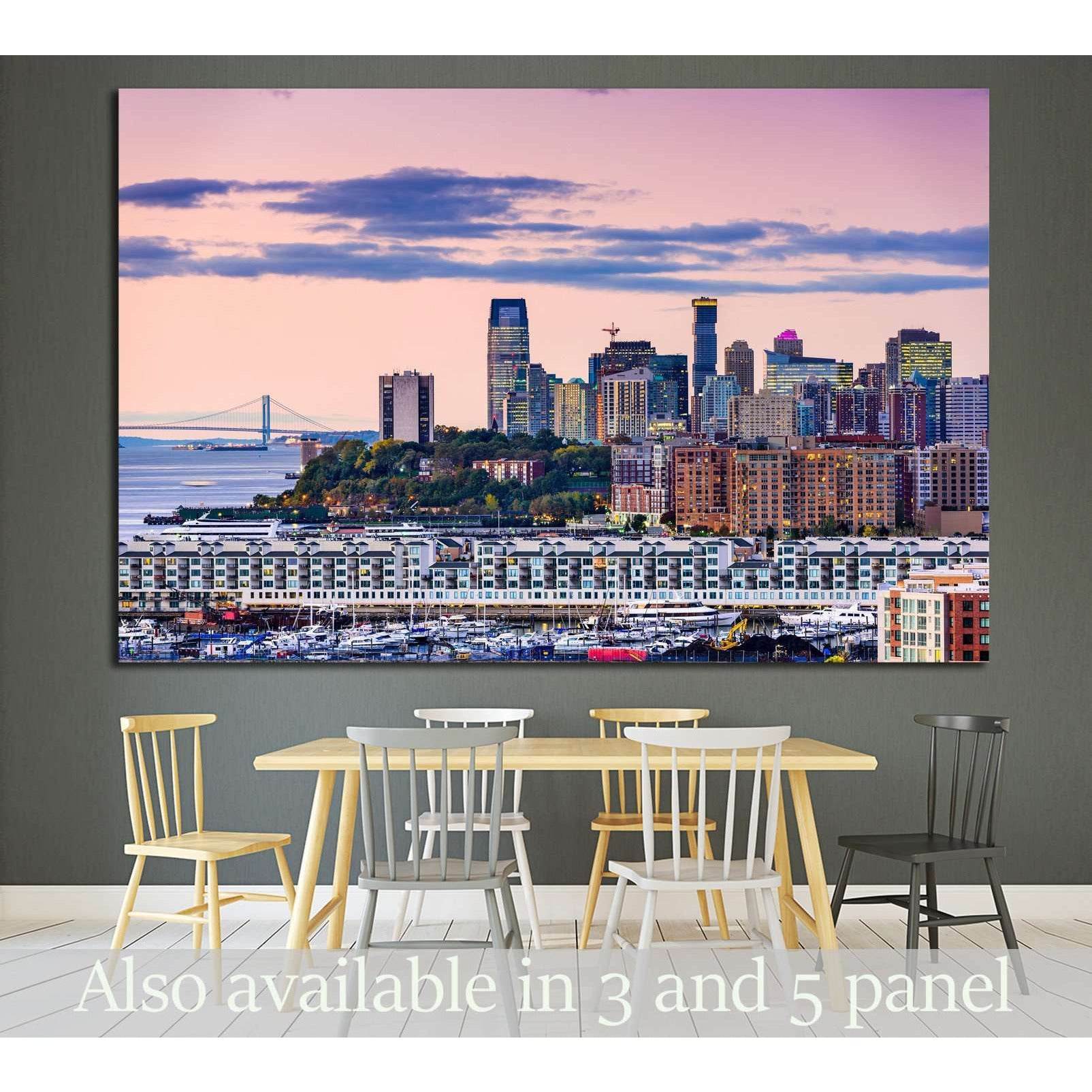 Jersey City skyline canvas print with pink sunset sky above the waterfront, displayed in a modern dining room
