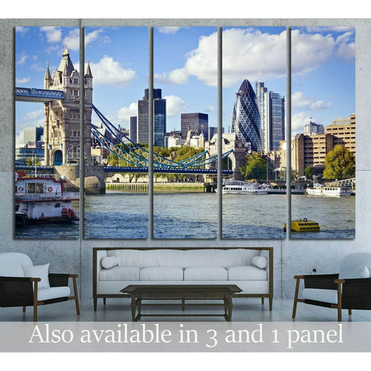 London Tower Bridge canvas print with Thames skyline hung above sofa in modern living room
