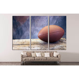 Football on old ages wood table and studio tan and blue back drop №2114 Ready to Hang Canvas Print