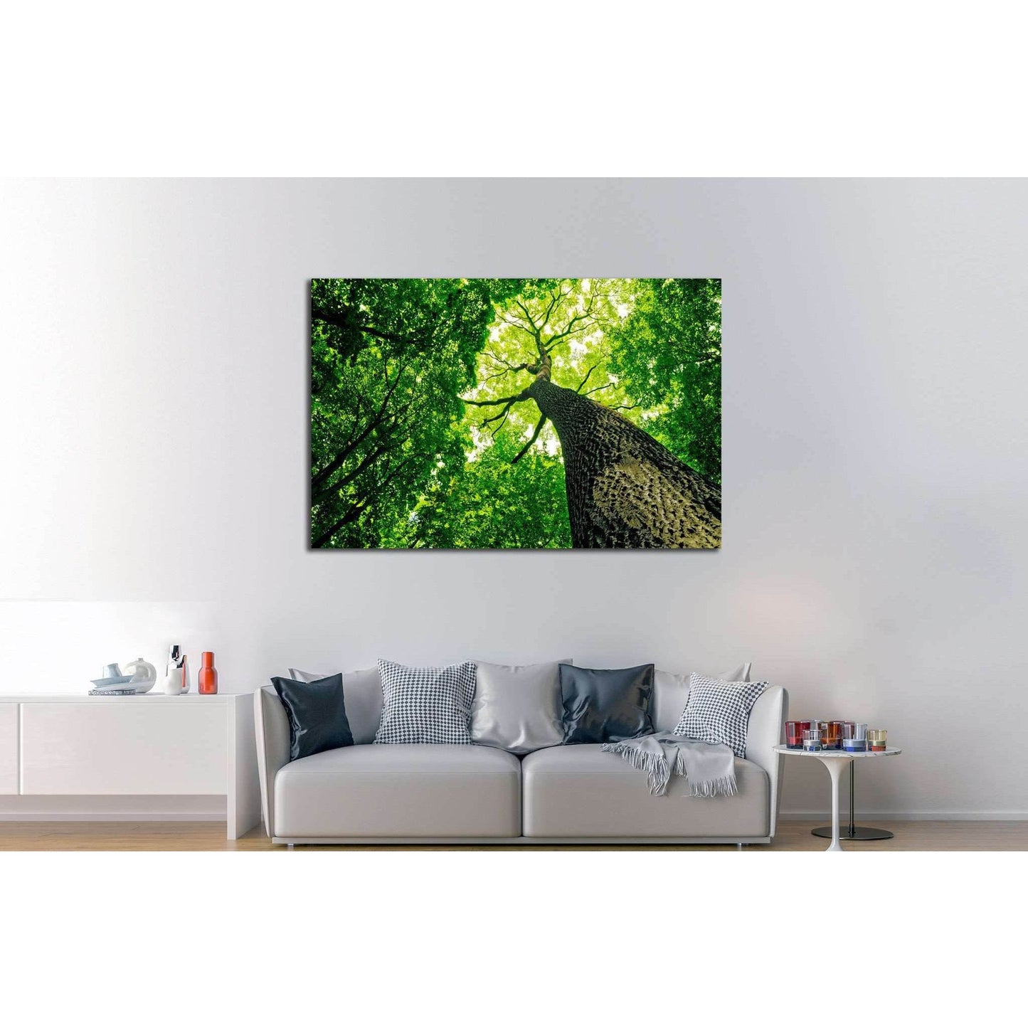 Upward Forest View Wall Art for Eco-Friendly InteriorsThis canvas print features an upward view of a towering tree, its trunk leading to a canopy of vibrant green leaves against the sky. This perspective celebrates the grandeur and vitality of nature, mak