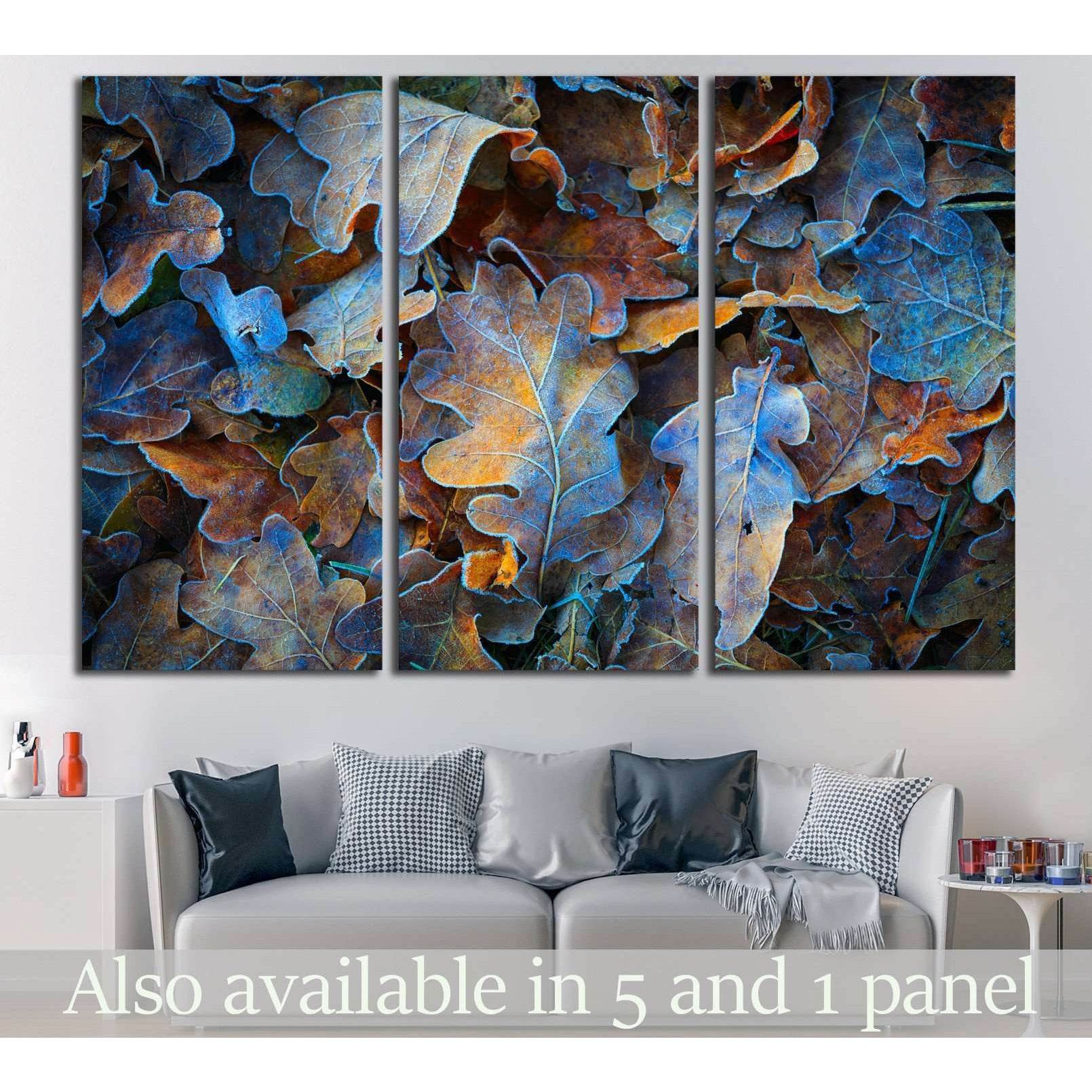 Autumn Hues Leaf Print for Dynamic Living Room Wall AccentsThis canvas print illustrates an intricate array of oak leaves in a spectrum of colors, from deep blues to rustic oranges, perfect for bringing an artistic and organic touch to spaces such as livi