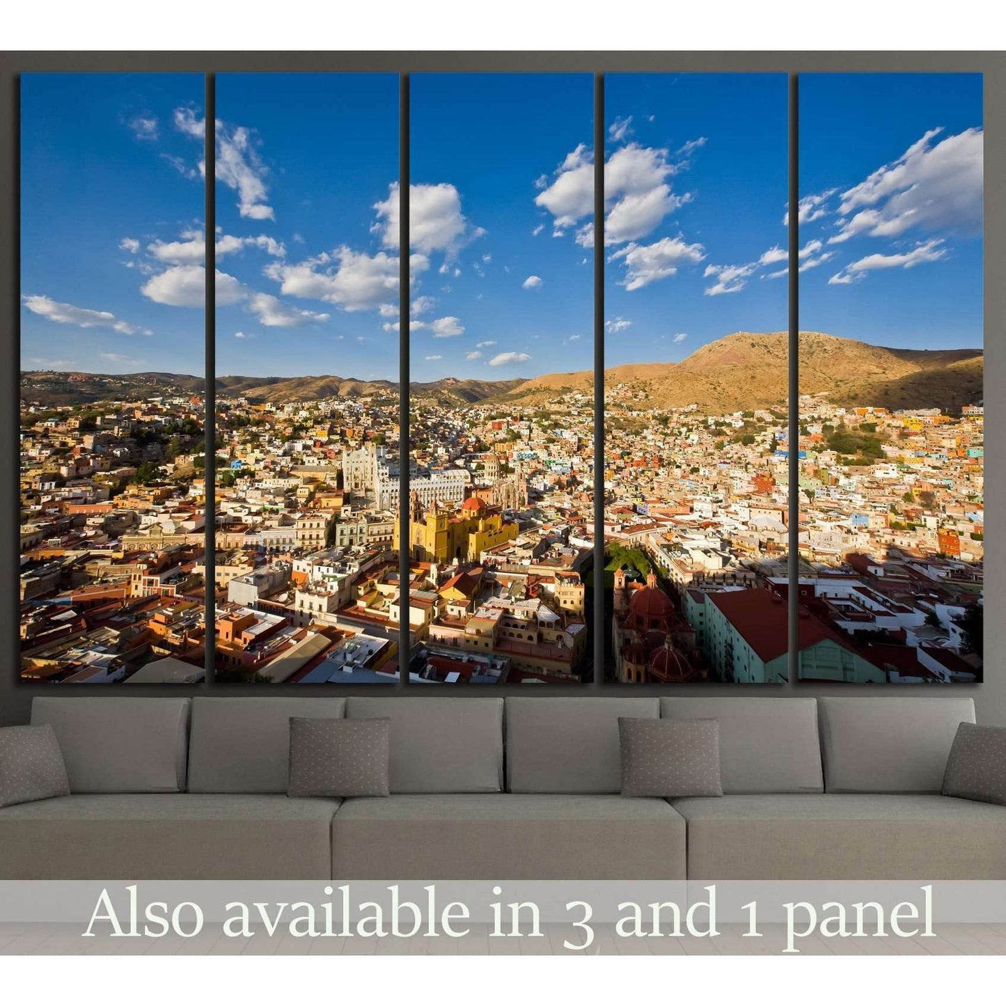 Guanajuato city canvas print with colorful hillside houses displayed above a sofa