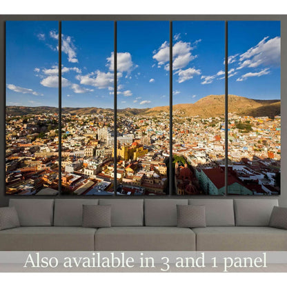 Guanajuato city canvas print with colorful hillside houses displayed above a sofa