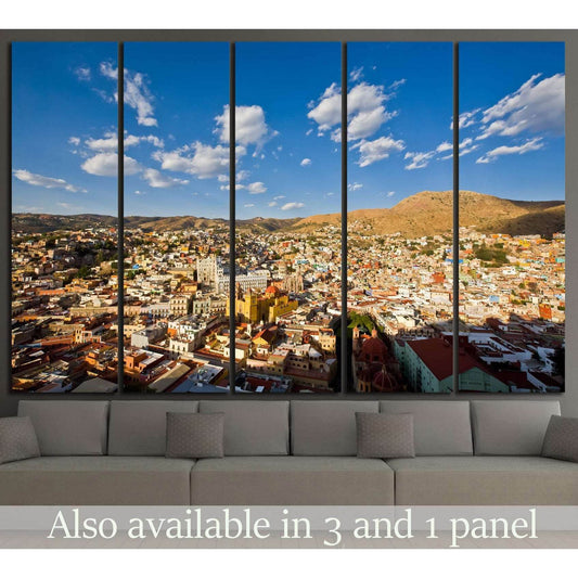 Guanajuato city canvas print with colorful hillside houses displayed above a sofa