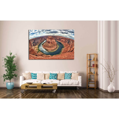 Horseshoe Bend River Canyon Multi-Panel Canvas PrintThis multi-panel canvas print features the iconic Horseshoe Bend, showcasing the natural meander of the Colorado River through rich, red canyon walls. It would serve as a stunning panoramic addition to s
