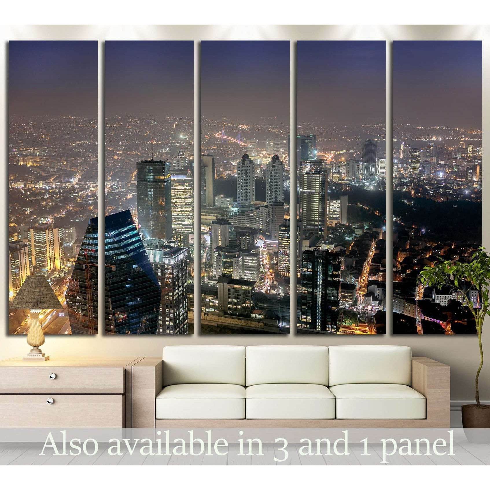 Istanbul skyline canvas print with glowing night city lights above sofa in a modern living room