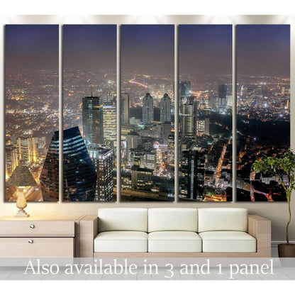 Istanbul skyline canvas print with glowing night city lights above sofa in a modern living room