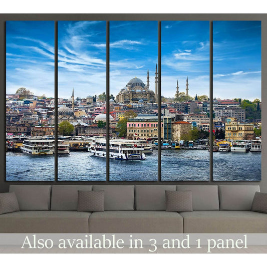 Istanbul skyline canvas print with Suleymaniye Mosque and boats on the Bosphorus above a sofa