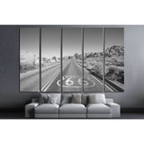Joshua Tree highway with Route 66 pavement sign in black and white №2107 Ready to Hang Canvas Print