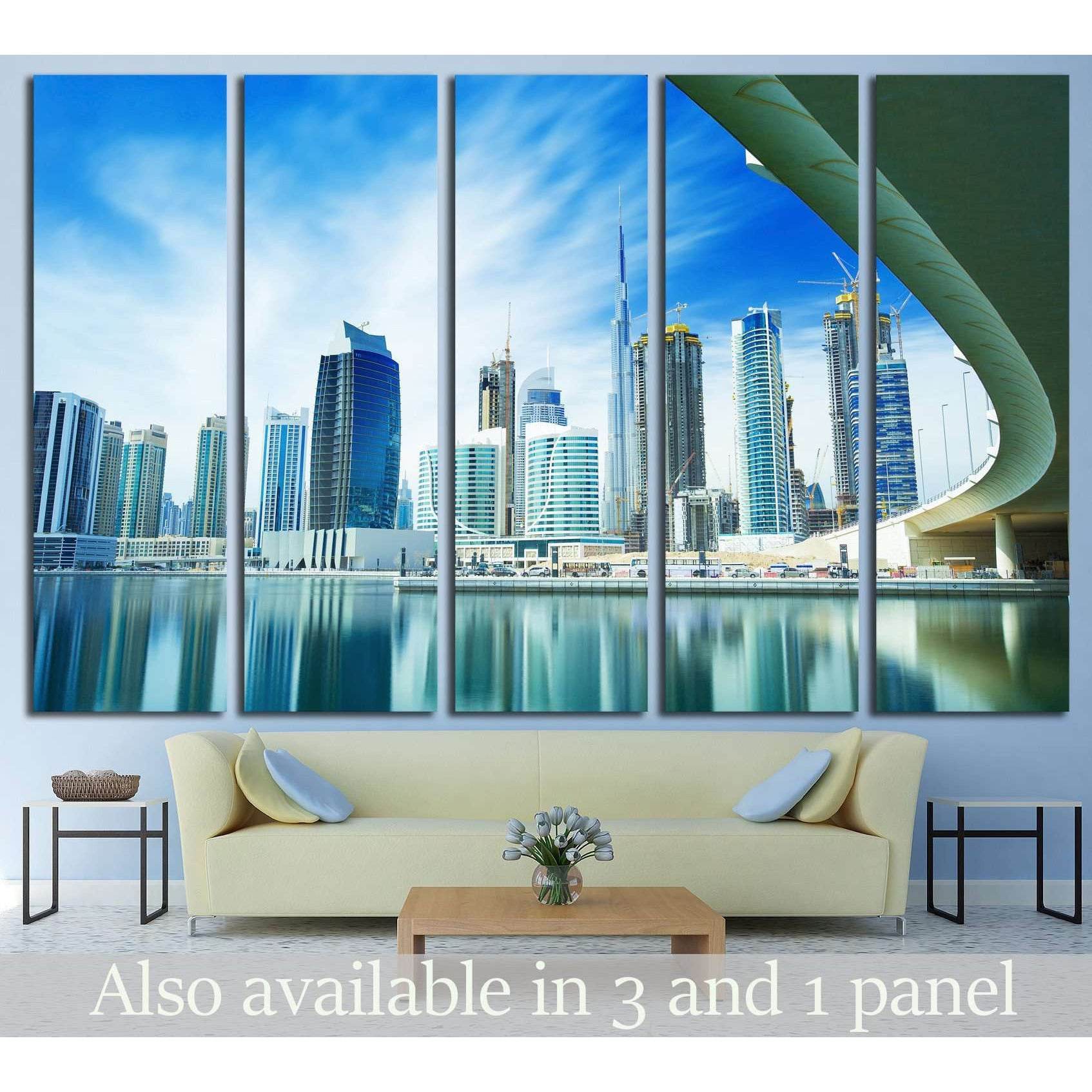 Dubai skyline canvas print with Burj Khalifa over a waterfront in a five-panel living room display
