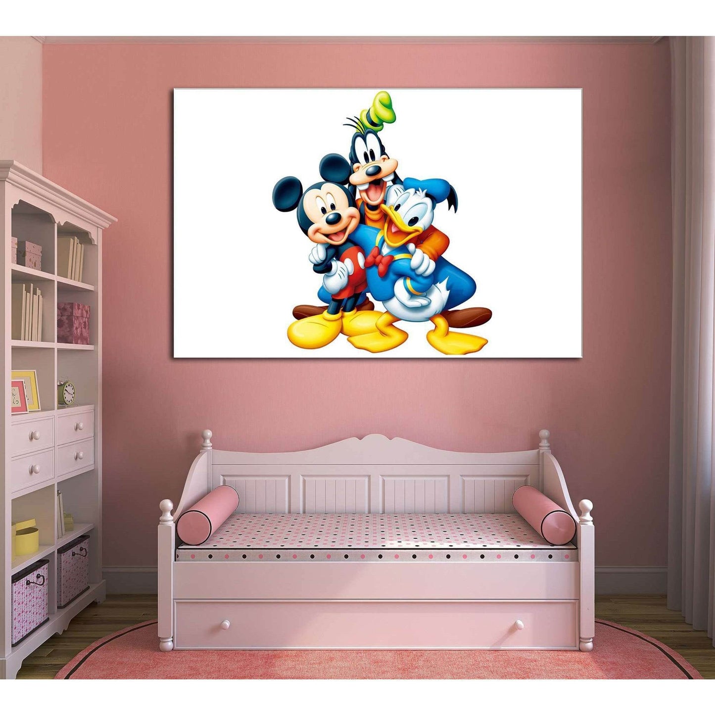 Mickey Mouse and friends canvas print showing Mickey, Donald Duck, and Goofy smiling together on a white background, hung above a pink daybed in a kids bedroom
