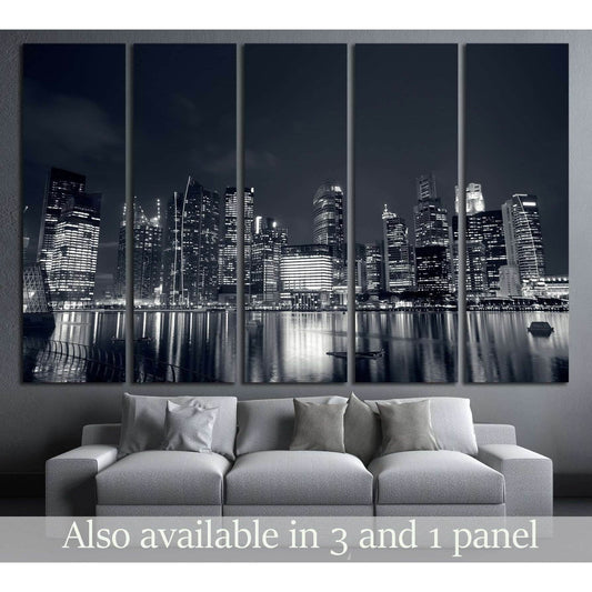 Black and white Singapore skyline canvas print above a sofa in a modern living room