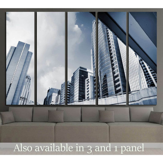 Blue-gray city skyline canvas print with modern skyscrapers in a 5-panel living room display