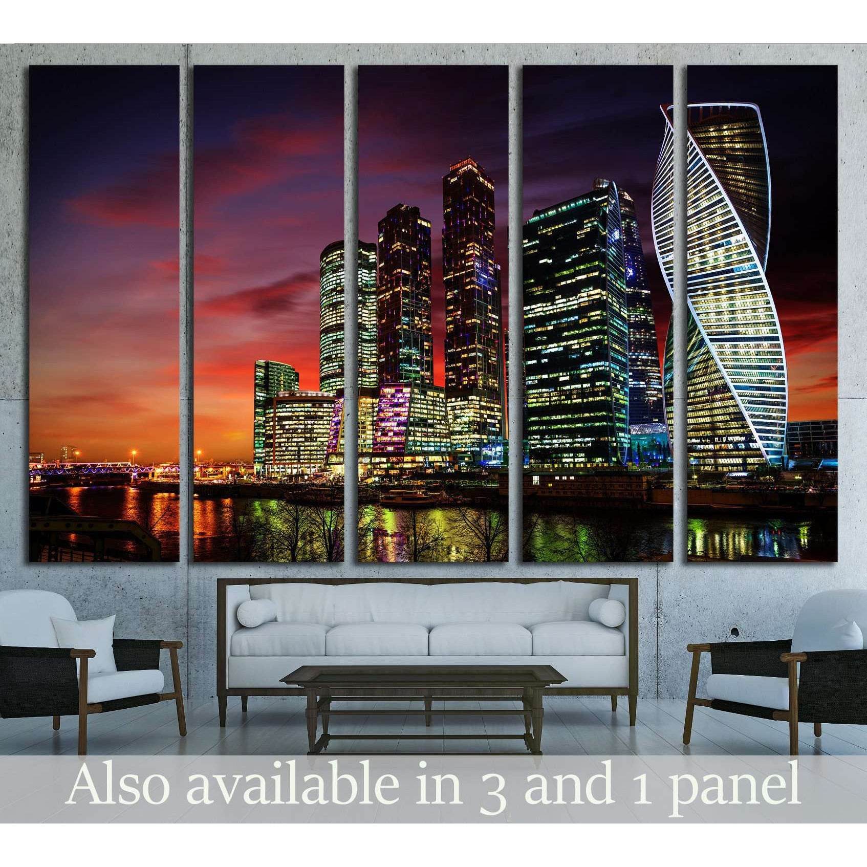 Moscow City skyline canvas print at night above sofa in a modern living room