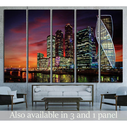 Moscow City skyline canvas print at night above sofa in a modern living room