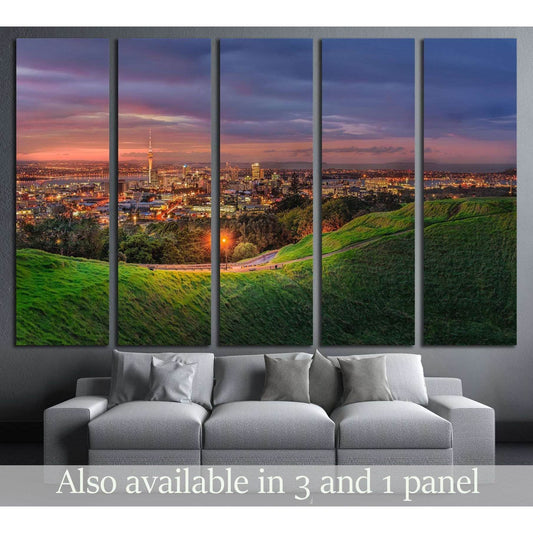 Auckland skyline canvas print from Mount Eden at dusk displayed above a sofa in a modern living room
