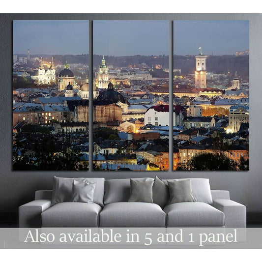 Lviv skyline triptych canvas print above sofa with church domes and old town lights at dusk