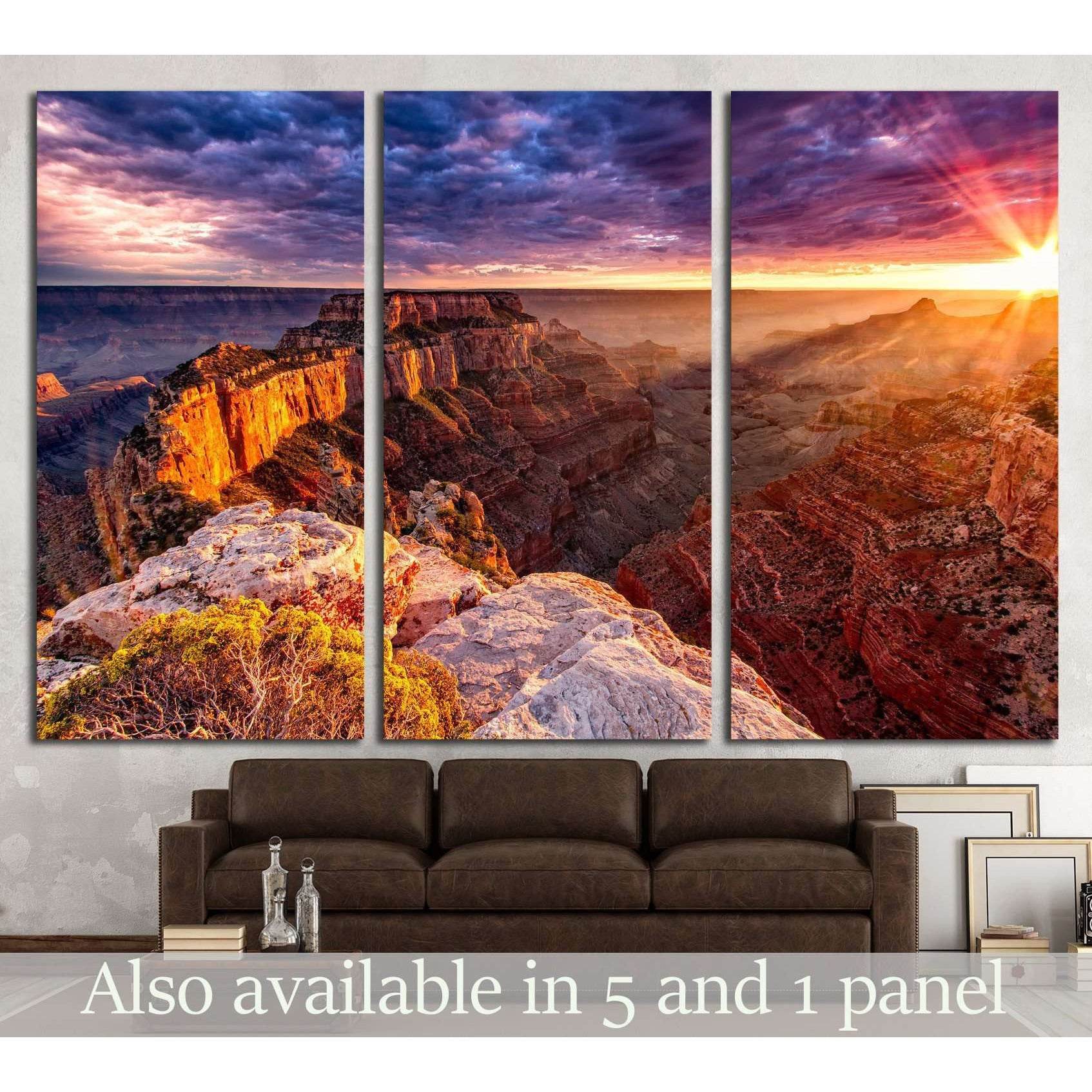 North Rim Grand Canyon Cape Royal №1962 Ready to Hang Canvas PrintThis triptych canvas print captures the breathtaking beauty of the North Rim of the Grand Canyon from Cape Royal at sunrise. The warm sunlight bathes the intricate rock formations in a gold