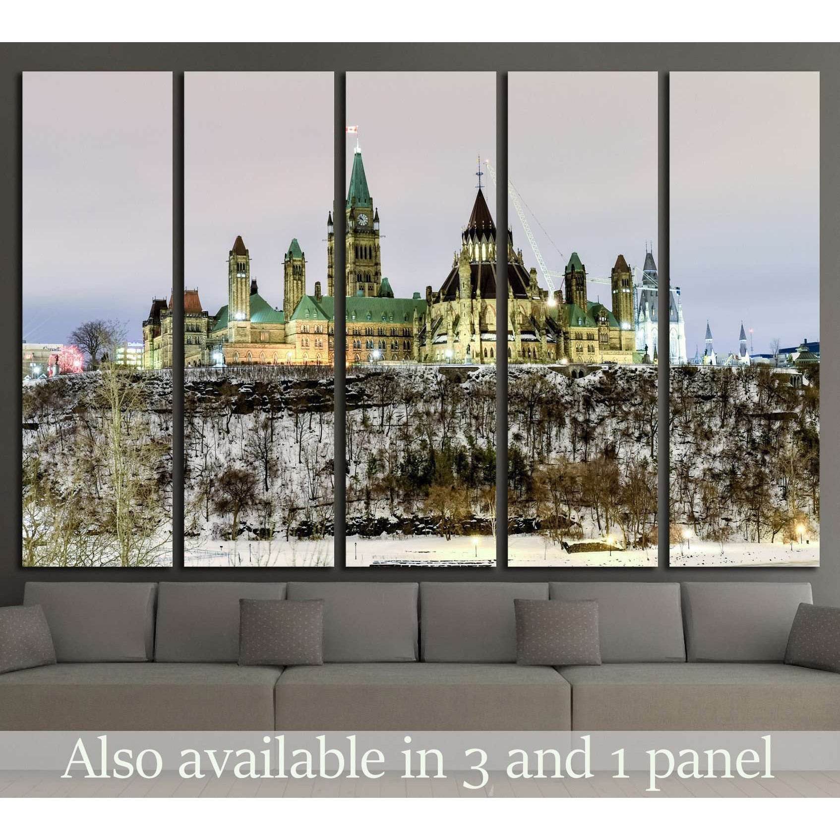 Ottawa Parliament Hill winter night canvas print displayed above a sofa in a modern living room